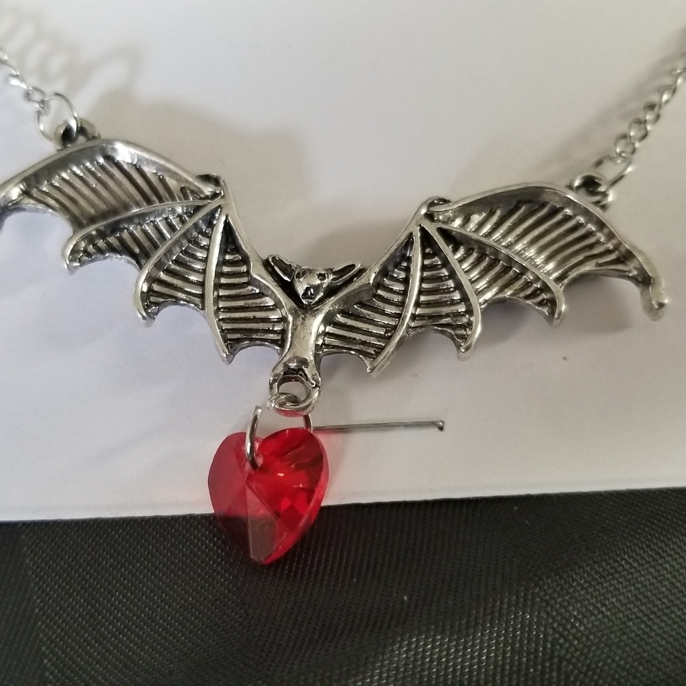 Flying bat and crystal necklaces